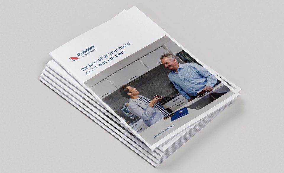 A stack of Pukeko Rental Managers brochures with the cover line We look after your home as if it was our own.